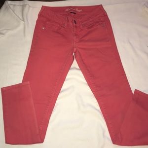 American Eagle orange pink stretch jeans